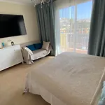 Апартаменти Luxury Townhouse Oasis Fanabe *